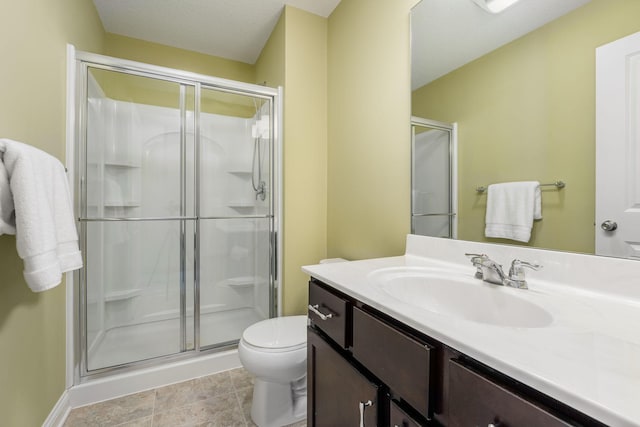 full bath with a shower stall, toilet, and vanity