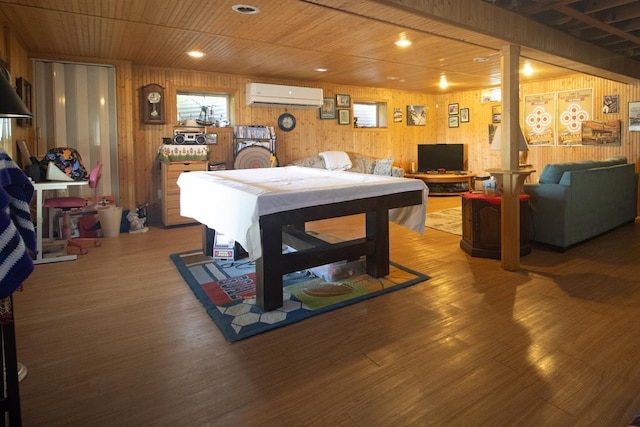 10873 69th Ave N, Maple Grove, MN 55369 - playroom with a wall mounted AC, wooden walls, wood ceiling, wood finished floors, and recessed lighting