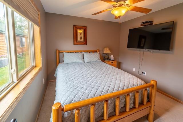 bedroom featuring ceiling fan and carpet flooring