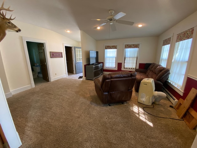 carpeted living room with ceiling fan, a baseboard radiator, and lofted ceiling