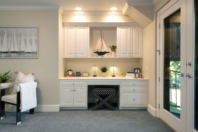 bar featuring light colored carpet and white cabinetry