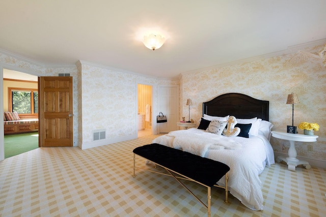 carpeted bedroom featuring crown molding