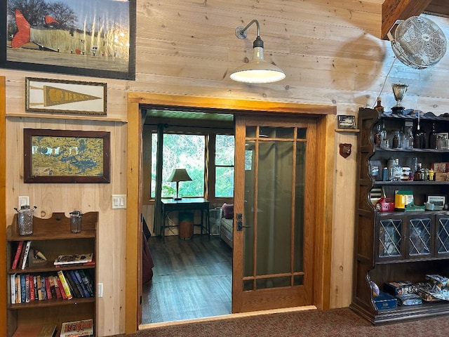 7155 Oak Narrows Rd, Greenwood Twp, MN 55723 - corridor featuring wood walls, wood finished floors, and wood ceiling