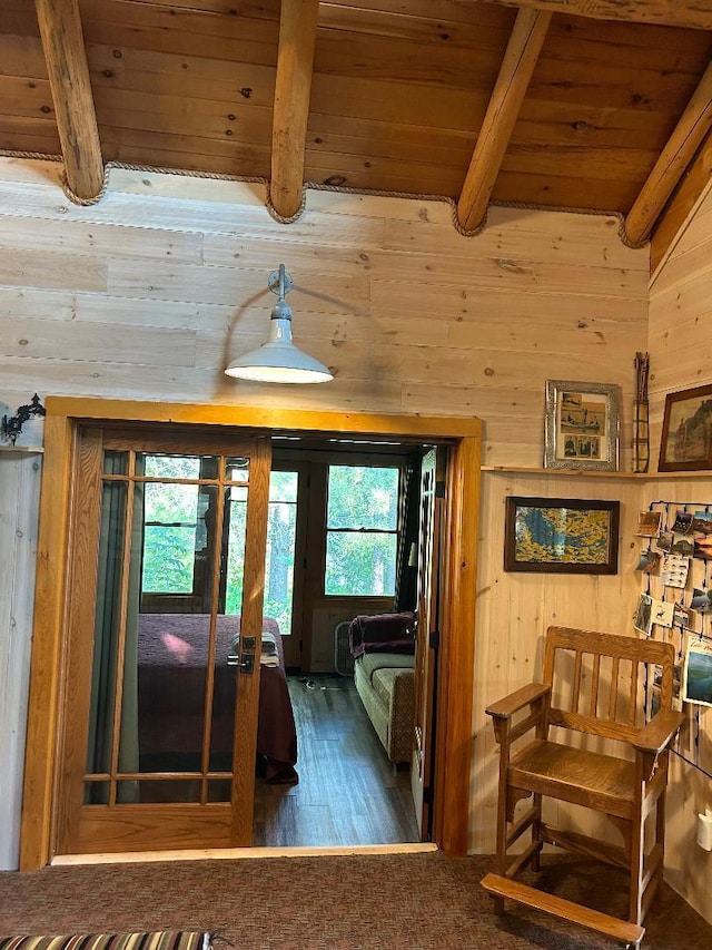 7155 Oak Narrows Rd, Greenwood Twp, MN 55723 - bedroom featuring beamed ceiling, wooden ceiling, wood walls, and wood finished floors
