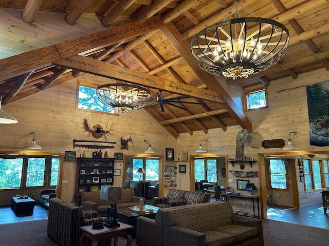 7155 Oak Narrows Rd, Greenwood Twp, MN 55723 - living area with high vaulted ceiling, a chandelier, wood walls, wood finished floors, and wooden ceiling