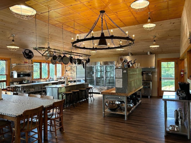7155 Oak Narrows Rd, Greenwood Twp, MN 55723 - dining area featuring wooden ceiling, dark wood finished floors, and a chandelier