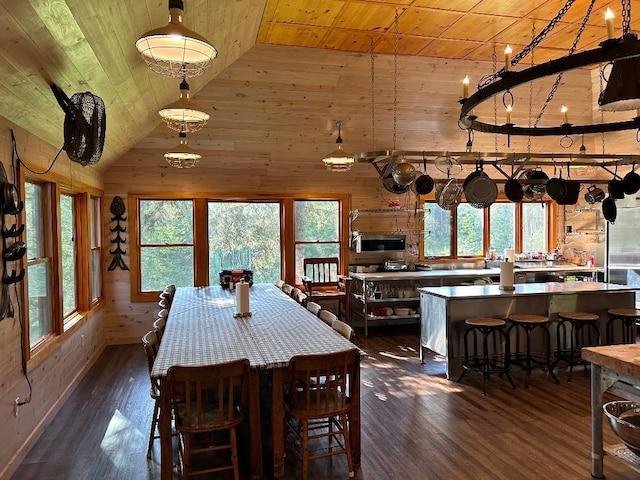 7155 Oak Narrows Rd, Greenwood Twp, MN 55723 - dining room featuring wood ceiling, healthy amount of natural light, dark wood-style floors, wooden walls, and high vaulted ceiling