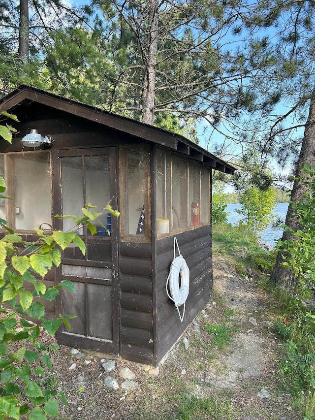 7155 Oak Narrows Rd, Greenwood Twp, MN 55723 - view of outbuilding with an outdoor structure and a water view