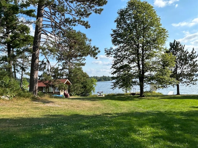 7155 Oak Narrows Rd, Greenwood Twp, MN 55723 - view of grassy yard featuring a water view