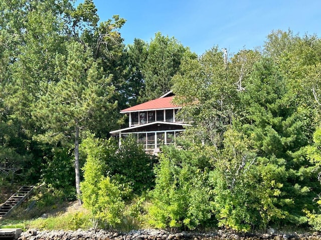 7155 Oak Narrows Rd, Greenwood Twp, MN 55723 - view of outdoor structure with a sunroom
