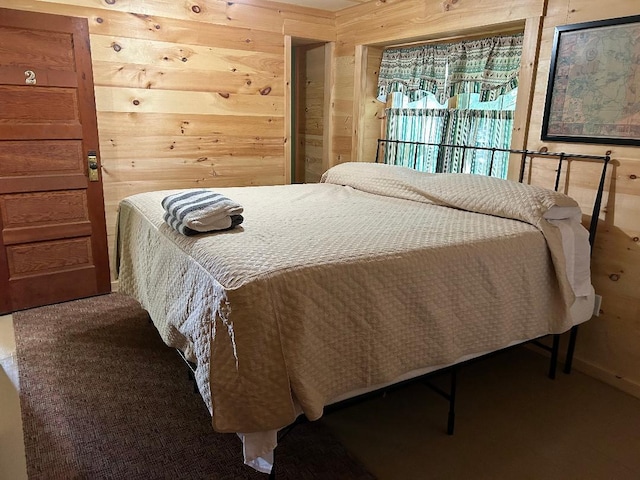 7155 Oak Narrows Rd, Greenwood Twp, MN 55723 - bedroom featuring wood walls