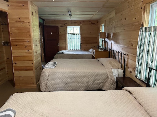 7155 Oak Narrows Rd, Greenwood Twp, MN 55723 - bedroom with wooden walls