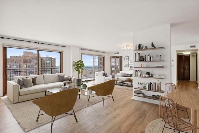 living room with light hardwood / wood-style floors