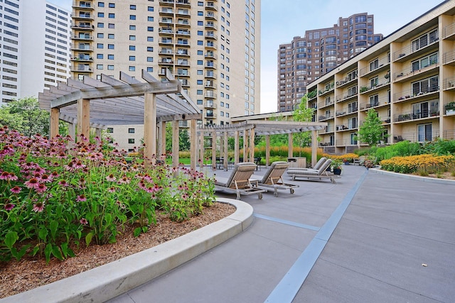 surrounding community featuring a pergola