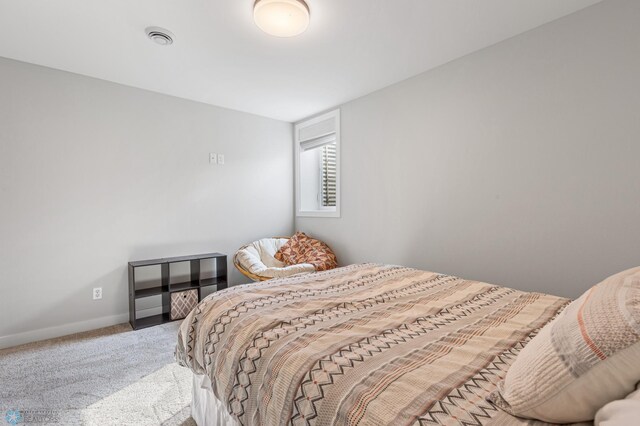 bedroom featuring carpet flooring