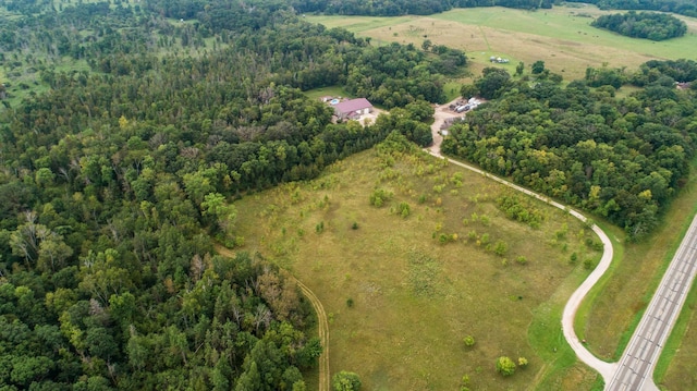 aerial view featuring a view of trees