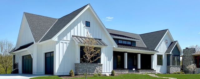 back of house featuring a garage