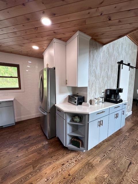 kitchen with wood ceiling, freestanding refrigerator, light countertops, white cabinetry, and open shelves