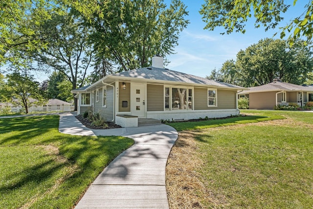 view of front of house with a front lawn and covered porch