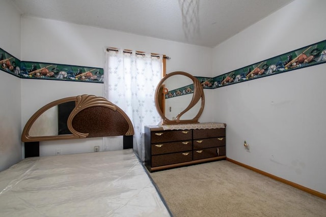 bedroom featuring carpet flooring