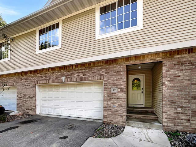 entrance to property with a garage