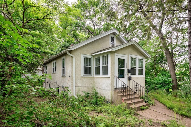 view of front of house featuring central air condition unit