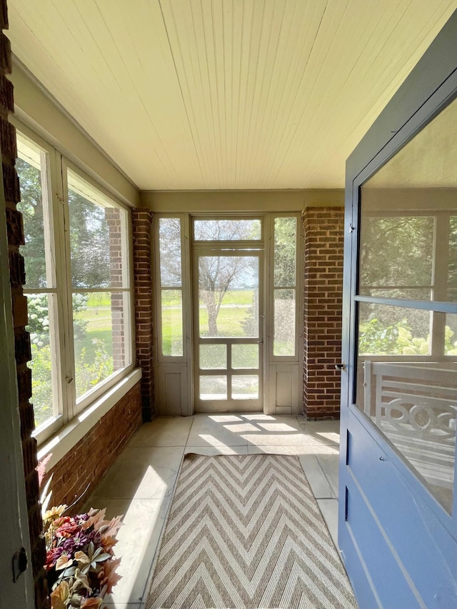 sunroom / solarium with wooden ceiling