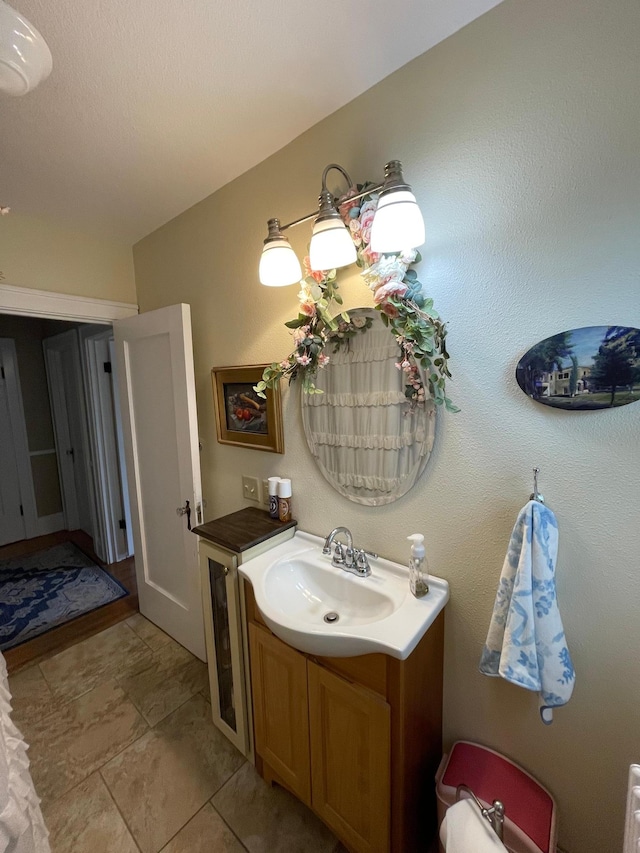 bathroom featuring vanity and tile patterned floors