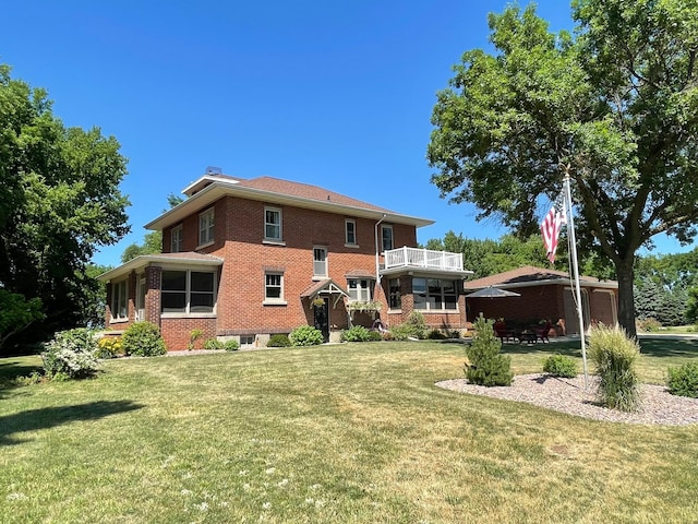 38364 200th St, Springfield, MN 56087 - rear view of house with a balcony, a chimney, a yard, and brick siding