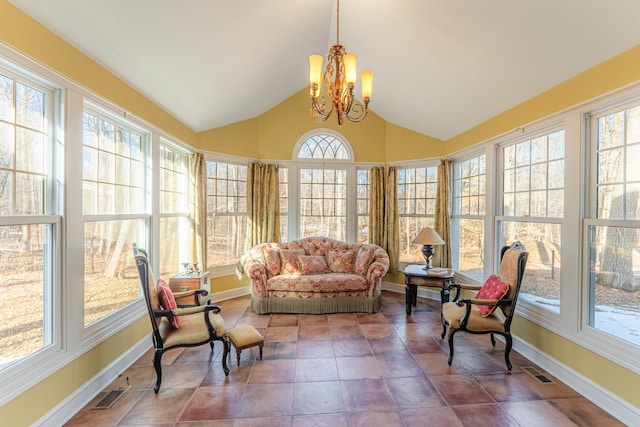 sunroom with visible vents, lofted ceiling, and a chandelier