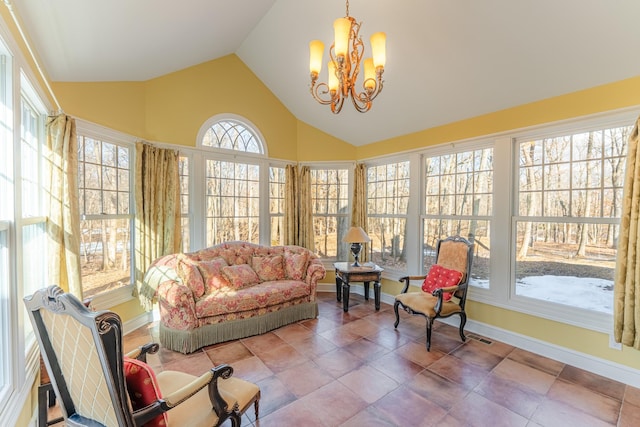 sunroom / solarium with a chandelier, visible vents, and vaulted ceiling