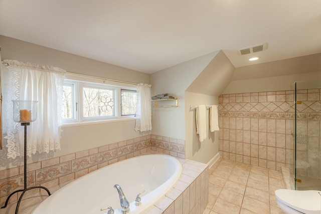 full bath featuring a bath, visible vents, tiled shower, tile patterned flooring, and toilet