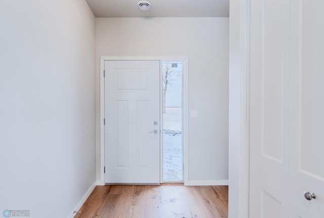 foyer with light hardwood / wood-style flooring