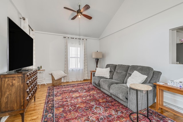 living room featuring light wood-type flooring, lofted ceiling, and ceiling fan