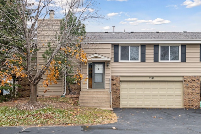 view of front of home featuring a garage