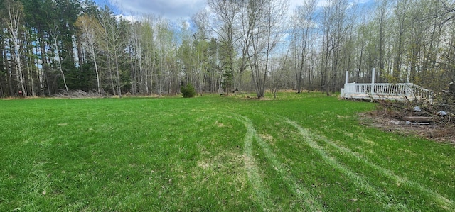 view of yard with a deck