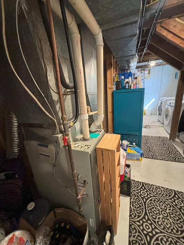 utility room featuring washer and dryer