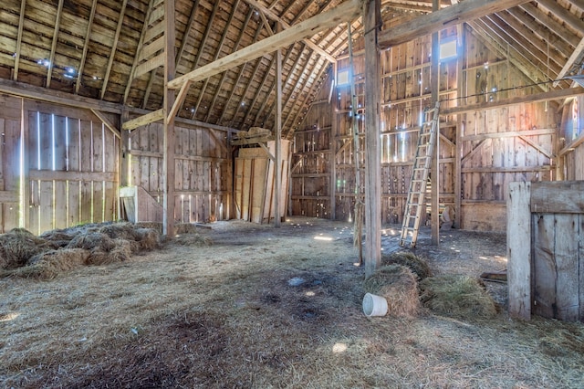 misc room with lofted ceiling