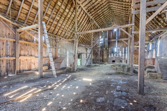 misc room with high vaulted ceiling