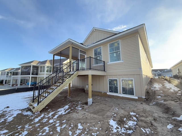 view of snow covered house