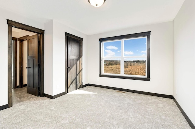 view of carpeted spare room