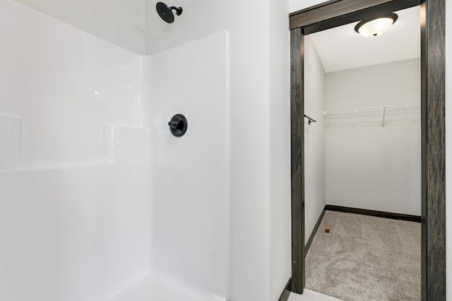 bathroom featuring a shower