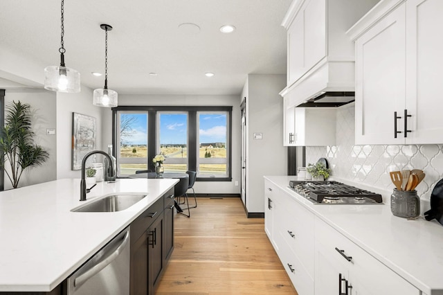 1105 136th St E, Rosemount, MN 55068 - kitchen with a sink, appliances with stainless steel finishes, recessed lighting, light countertops, and tasteful backsplash