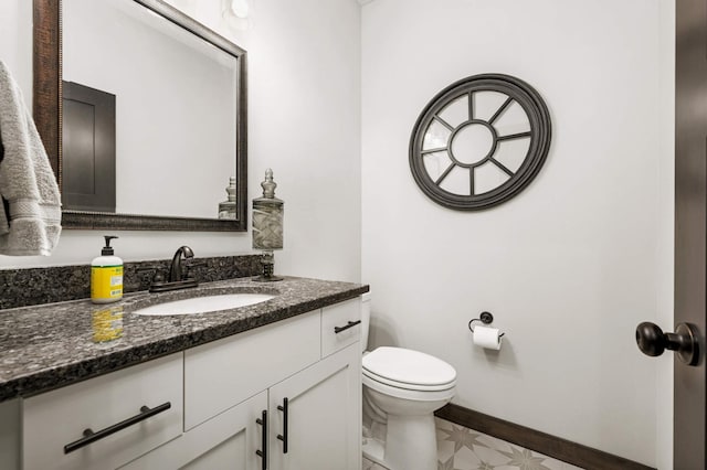 1105 136th St E, Rosemount, MN 55068 - bathroom with vanity, toilet, and baseboards