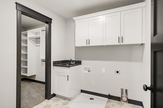 1105 136th St E, Rosemount, MN 55068 - laundry room featuring light floors, washer hookup, electric dryer hookup, cabinet space, and baseboards