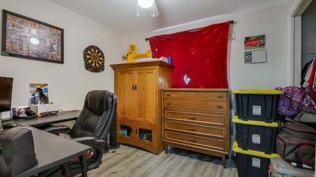 office area featuring light hardwood / wood-style floors and ceiling fan