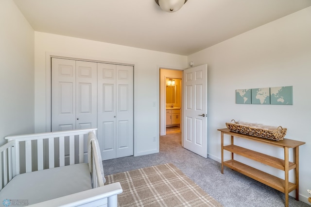 bedroom featuring a closet and carpet floors