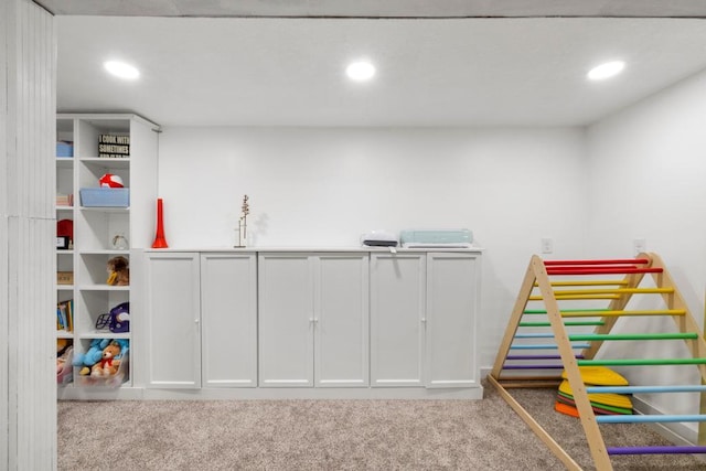 playroom with light carpet and recessed lighting