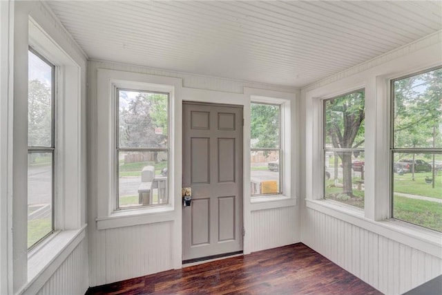 unfurnished sunroom with a wealth of natural light