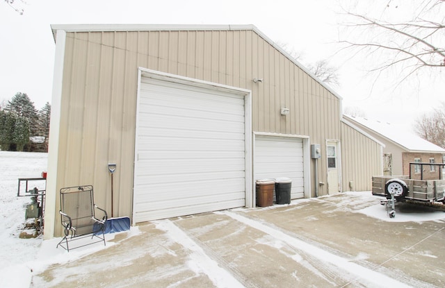 view of snow covered garage